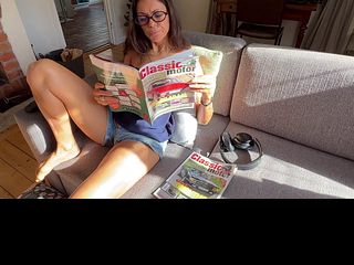 I was chillin' reading my cars' magazine when my hubby decided to fuck my pussy with my big dildo