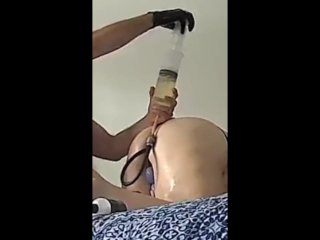 Big ass Granny given ENEMA and FISTED